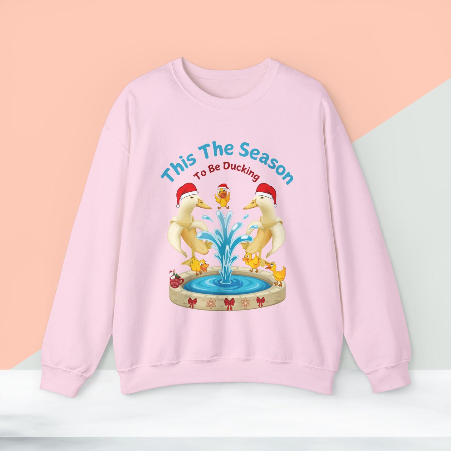 This The Season To Be Ducking Christmas Sweatshirt - Unisex Heavy Blend, Merry Christmas, Festive, Christmas Gift, Crewneck, merry Christmas Sweatshirt, Christmas Sweatshirt Christmas Gift, Festive Sweatshirt.
